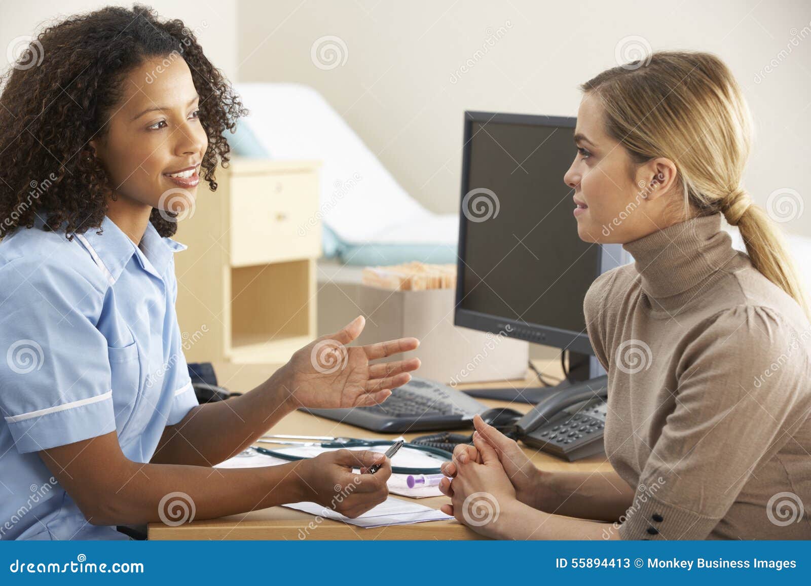 nurse injecting female patient