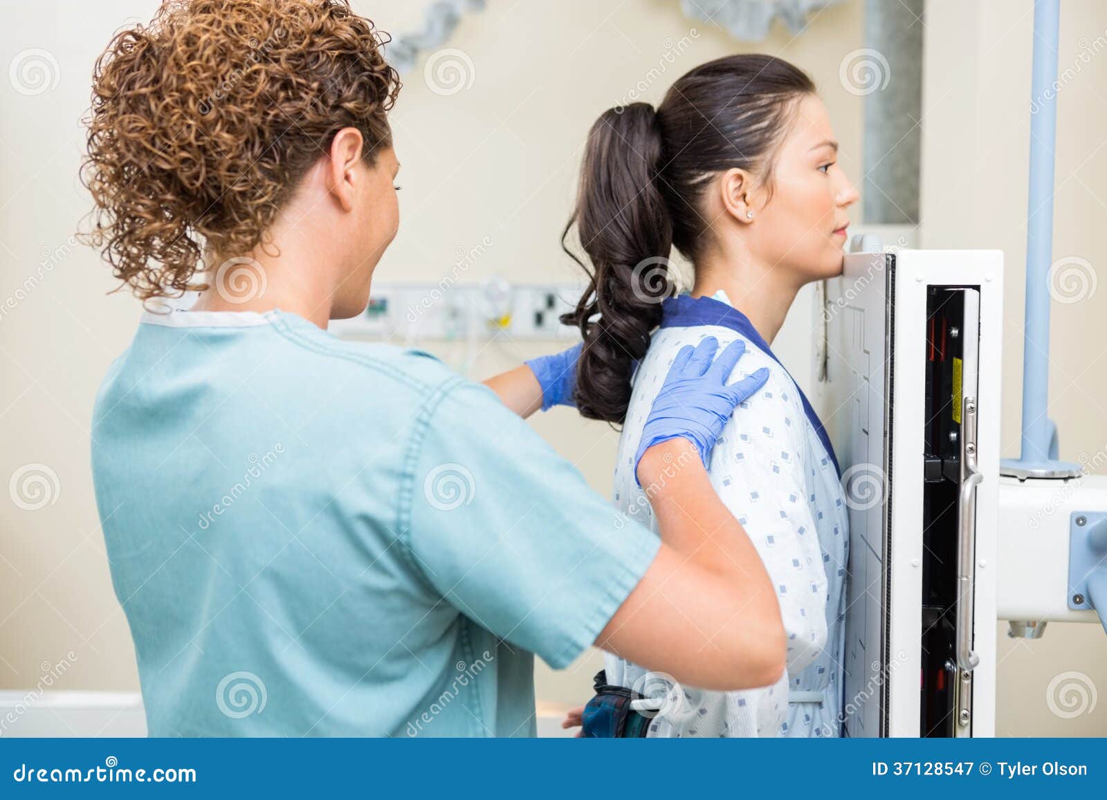 Nurse Preparing Patient For Chest Xray Royalty Free Stock