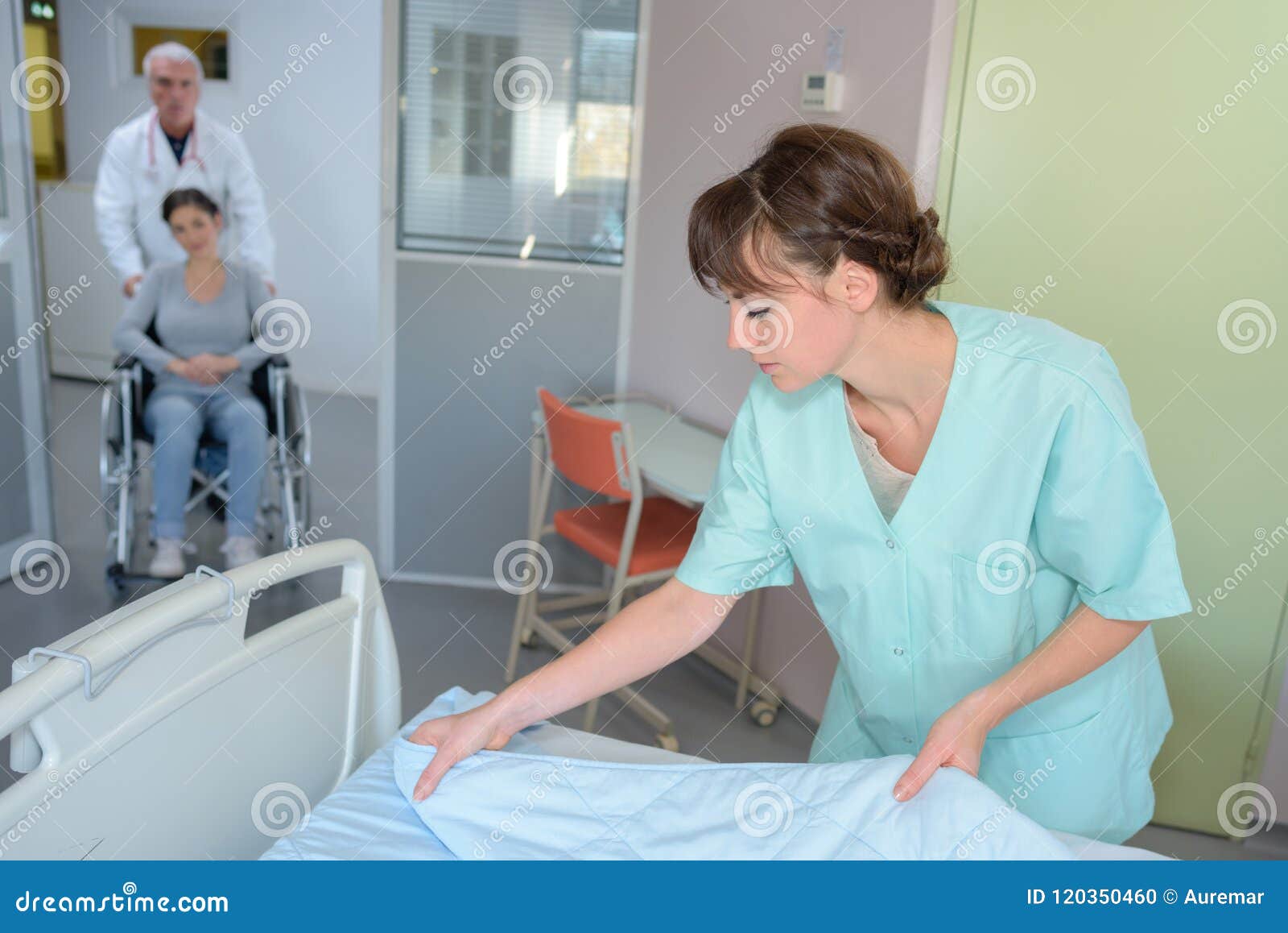 Nurse Preparing Sheets on Hospital Bed Stock Photo Image of hospital