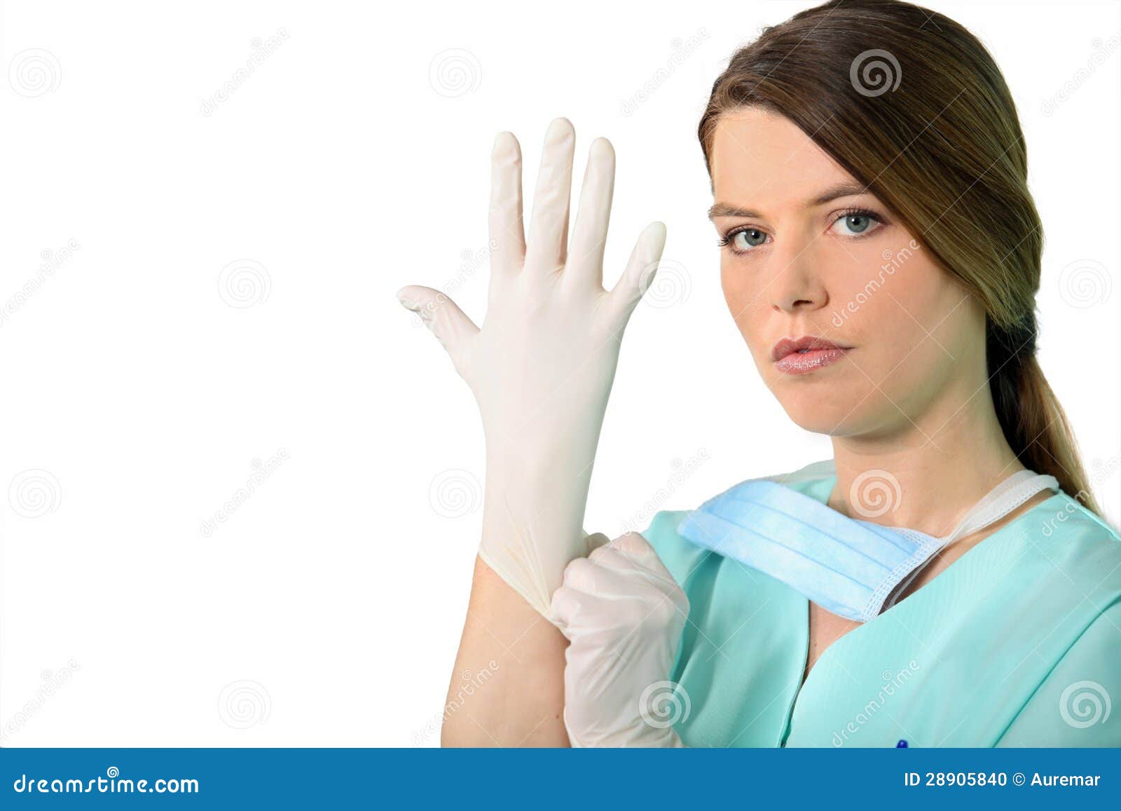 Nurse putting on gloves stock photo. Image of trainee 28905840