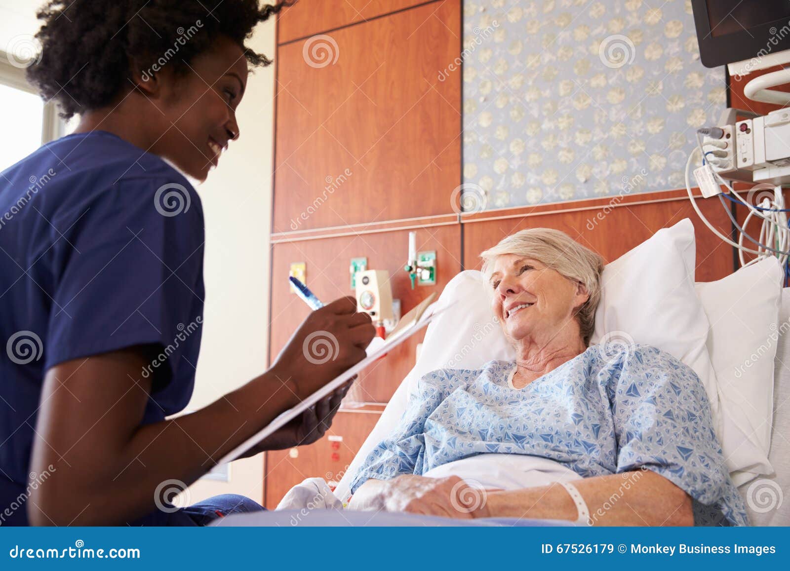 Nurse Talking To A Senior Patient Stock Photo - Image of 