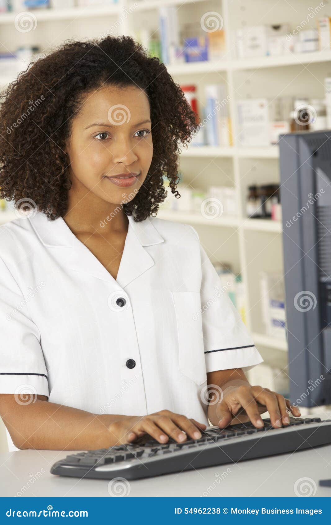 Nurse Working on Computer in Pharmacy Stock Photo Image of