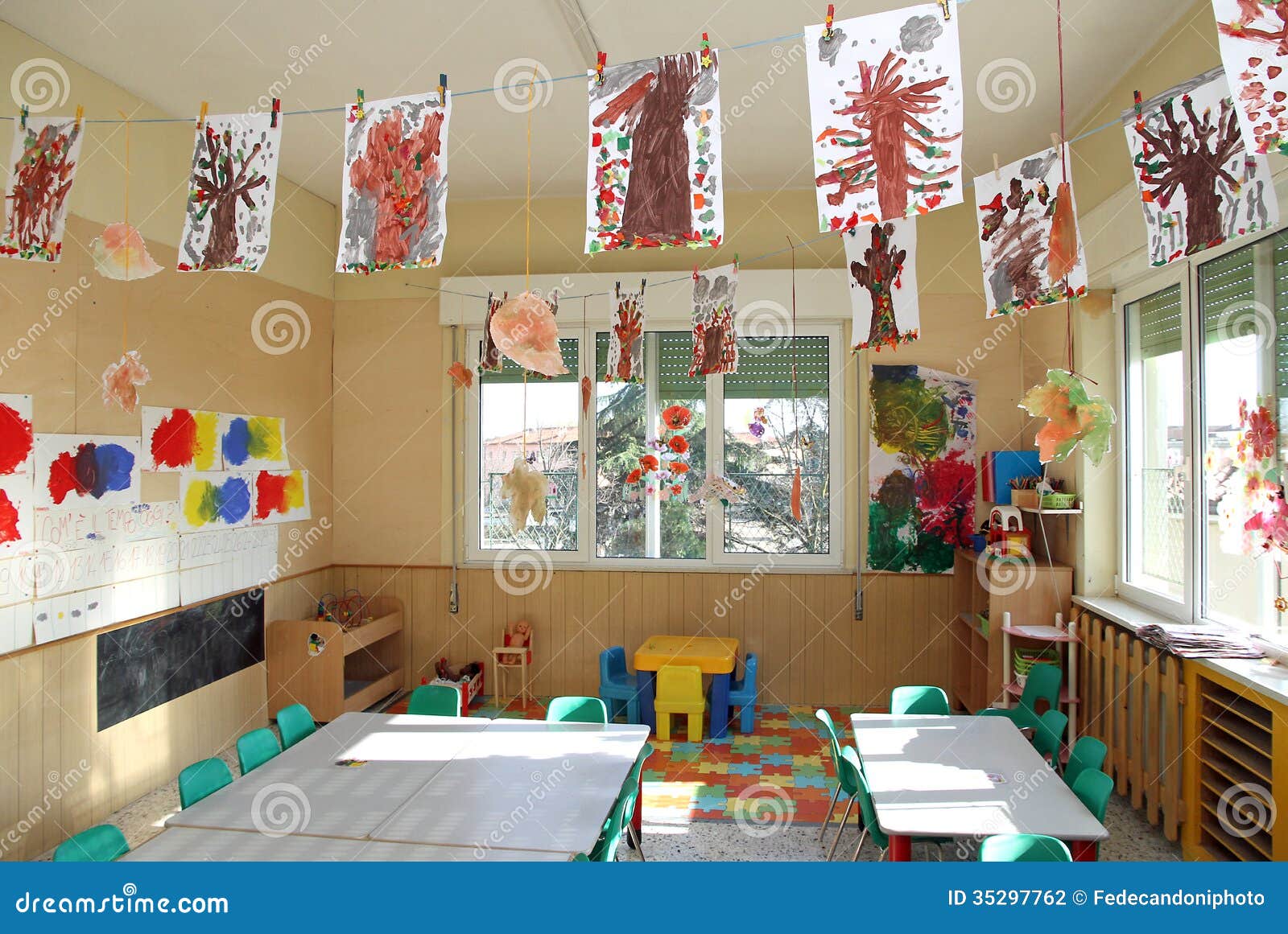 Nursery Class Of Children With Many Drawings Of Trees