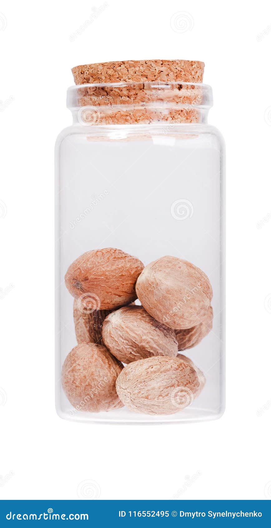 nutmeg in a glass bottle with cork stopper,  on white.