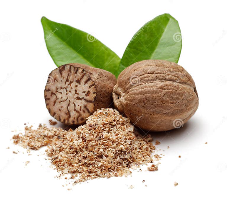 Nutmeg Granules and Nutmegs with Leaves Stock Photo Image of heap
