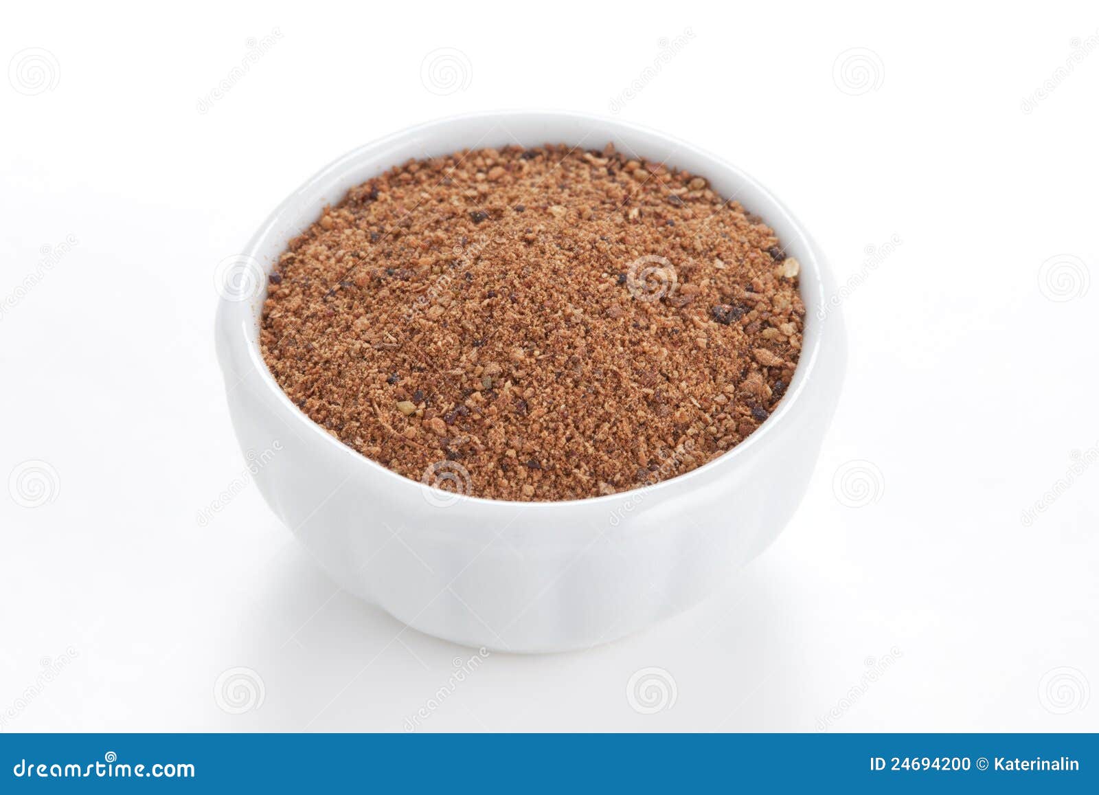Nutmeg Powder in a Bowl on White Background. Stock Photo Image of
