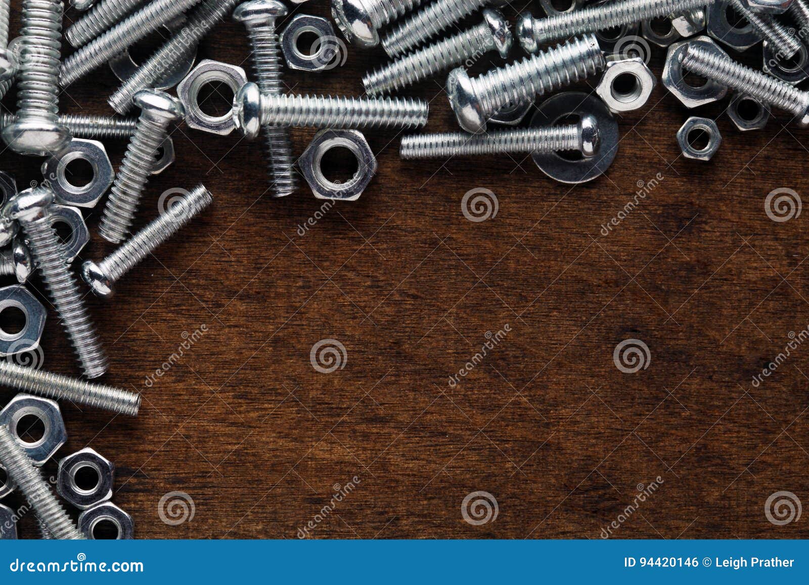 Nuts and bolts background stock photo. Image of industry 94420146