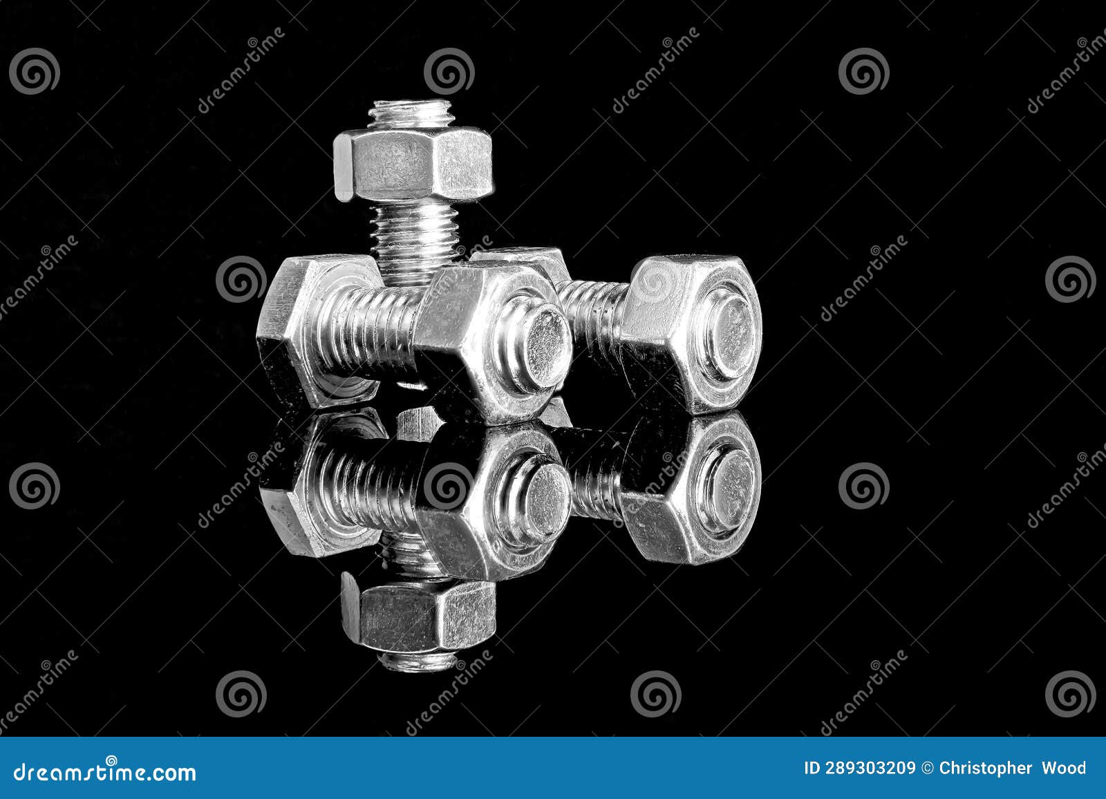 nuts and bolts, three reflected so looks like six