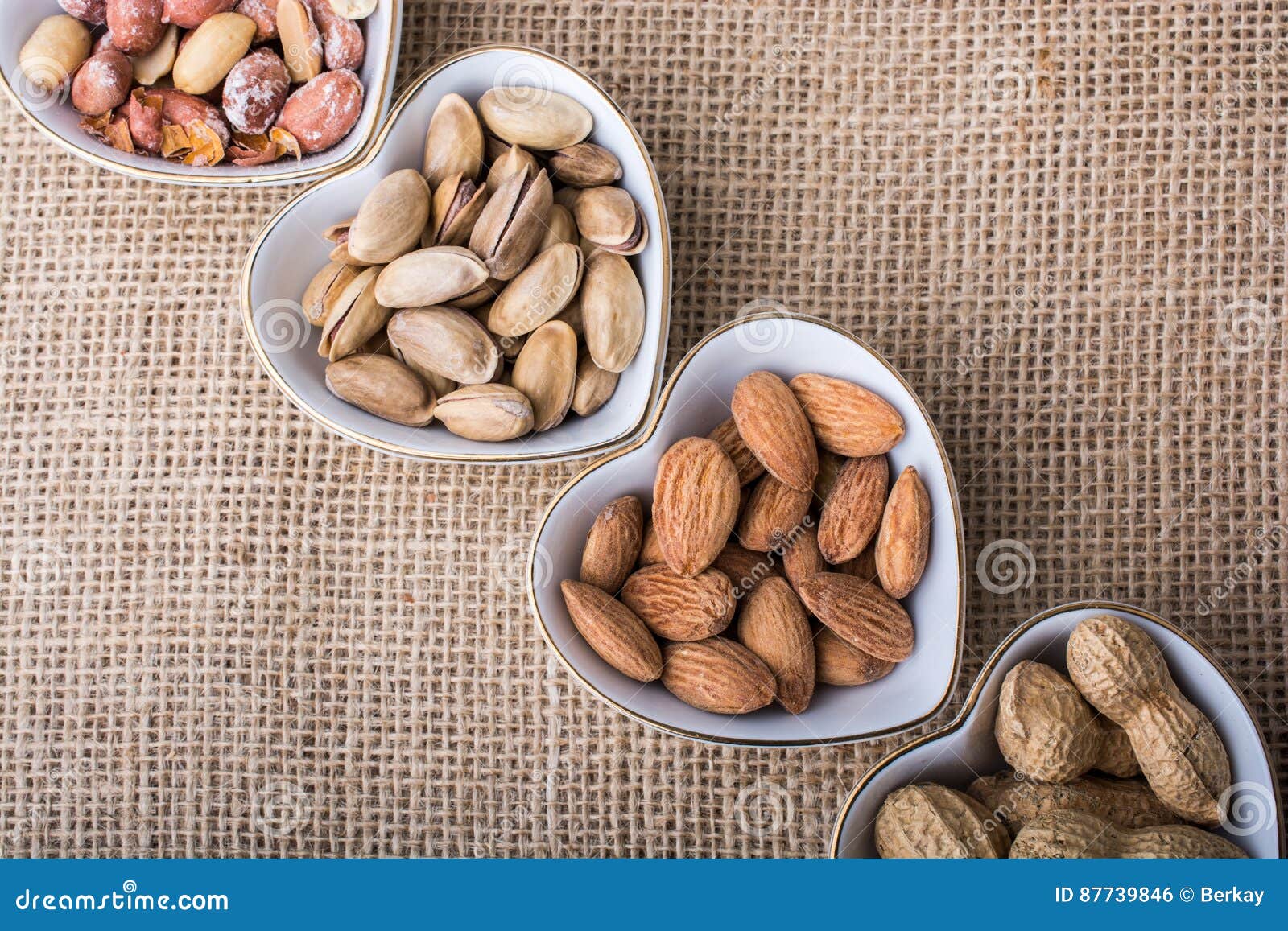 Nuts in Heart Shaped Plates on Canvas Stock Photo Image of vegetarian