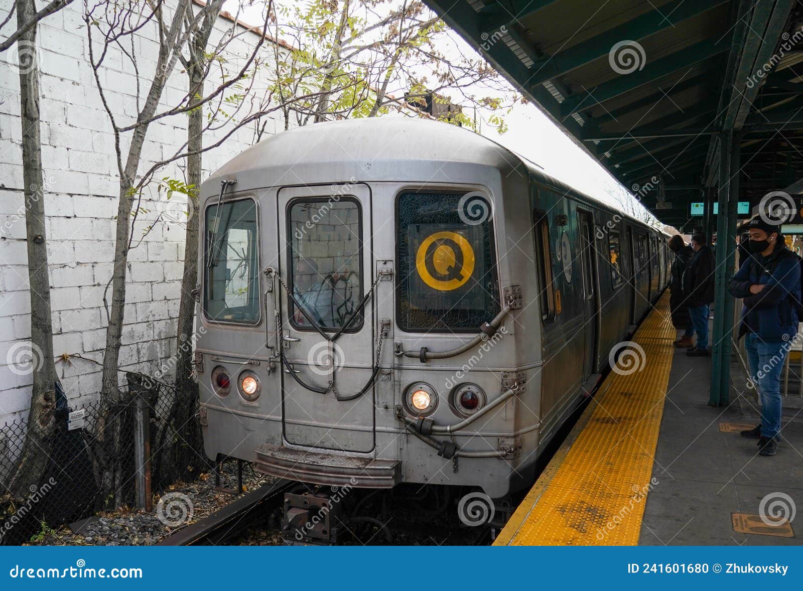 NYC Subway Q Train Arriving at Kings Highway Station in Brooklyn