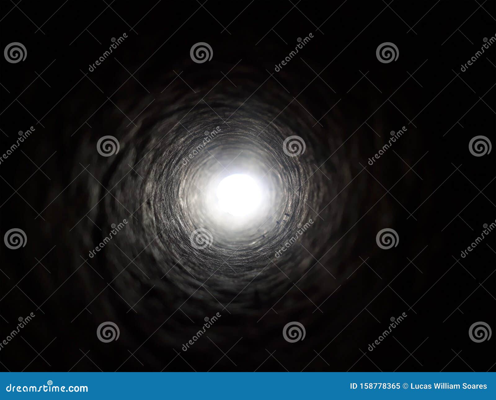 black tunnel with light in the end, background. dark toward light. abstract of light at the end tunnel.