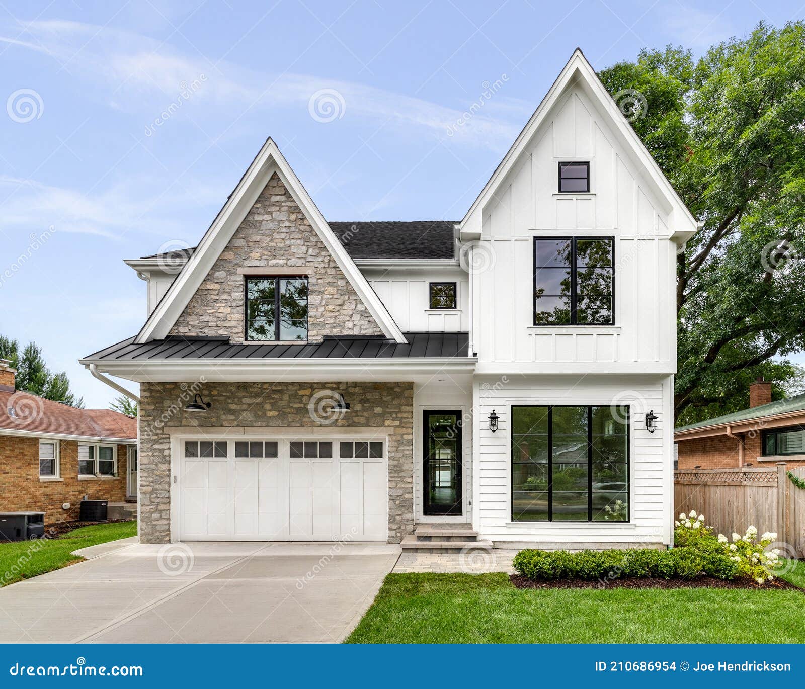 A Modern Farmhouse Home With A White And Brick Exterior Editorial Stock Image Image Of Landscaping Expensive 210686954