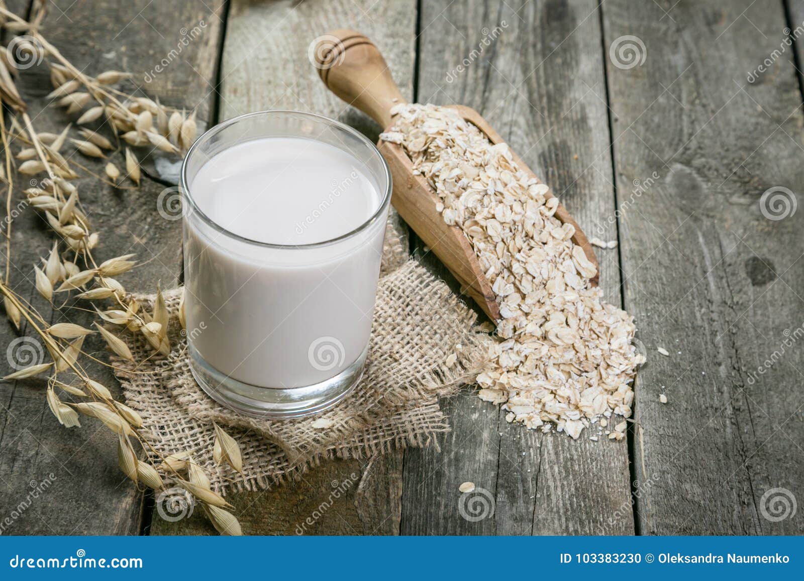oat milk alternative on rustic wood background