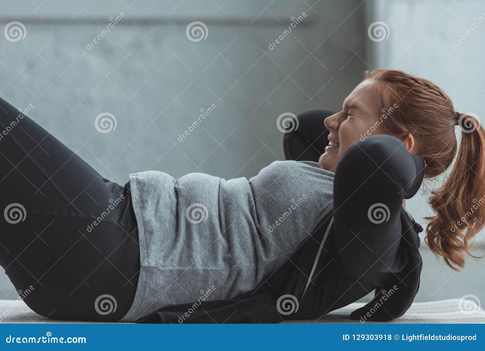 Obese Girl Performing Sit Ups Stock Photo Image of people, sweaty