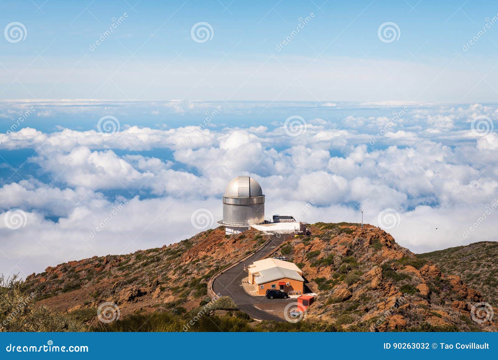 observatory over the clouds
