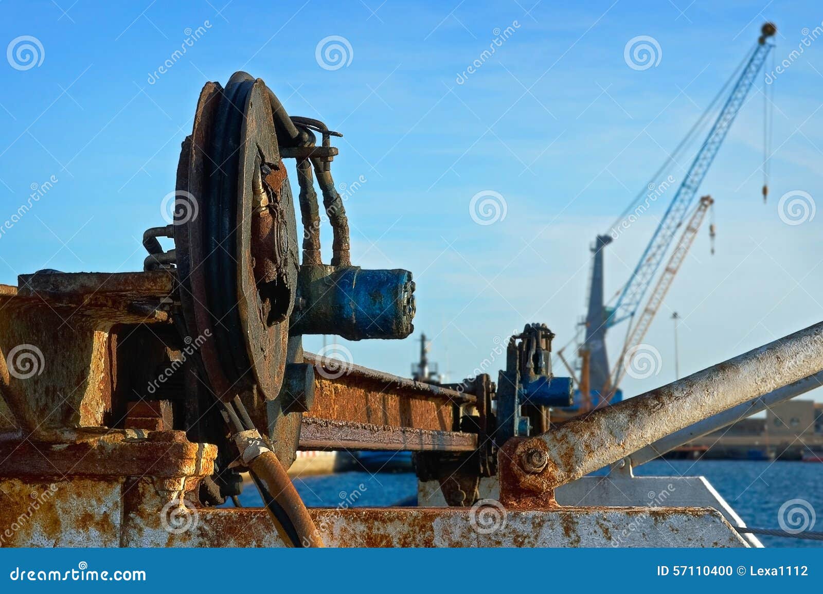 Obsolete Equipment on a Background of Modern Cranes Stock Photo Image of generation, metal