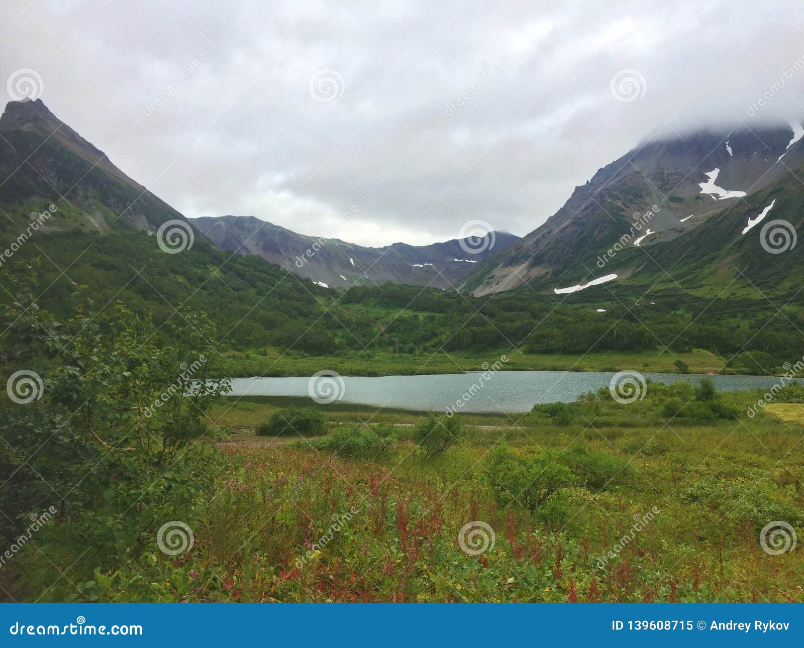 lake tahkoloch lies at the base of the extinct vachkazhets volcano on the kamchatka peninsula, russia