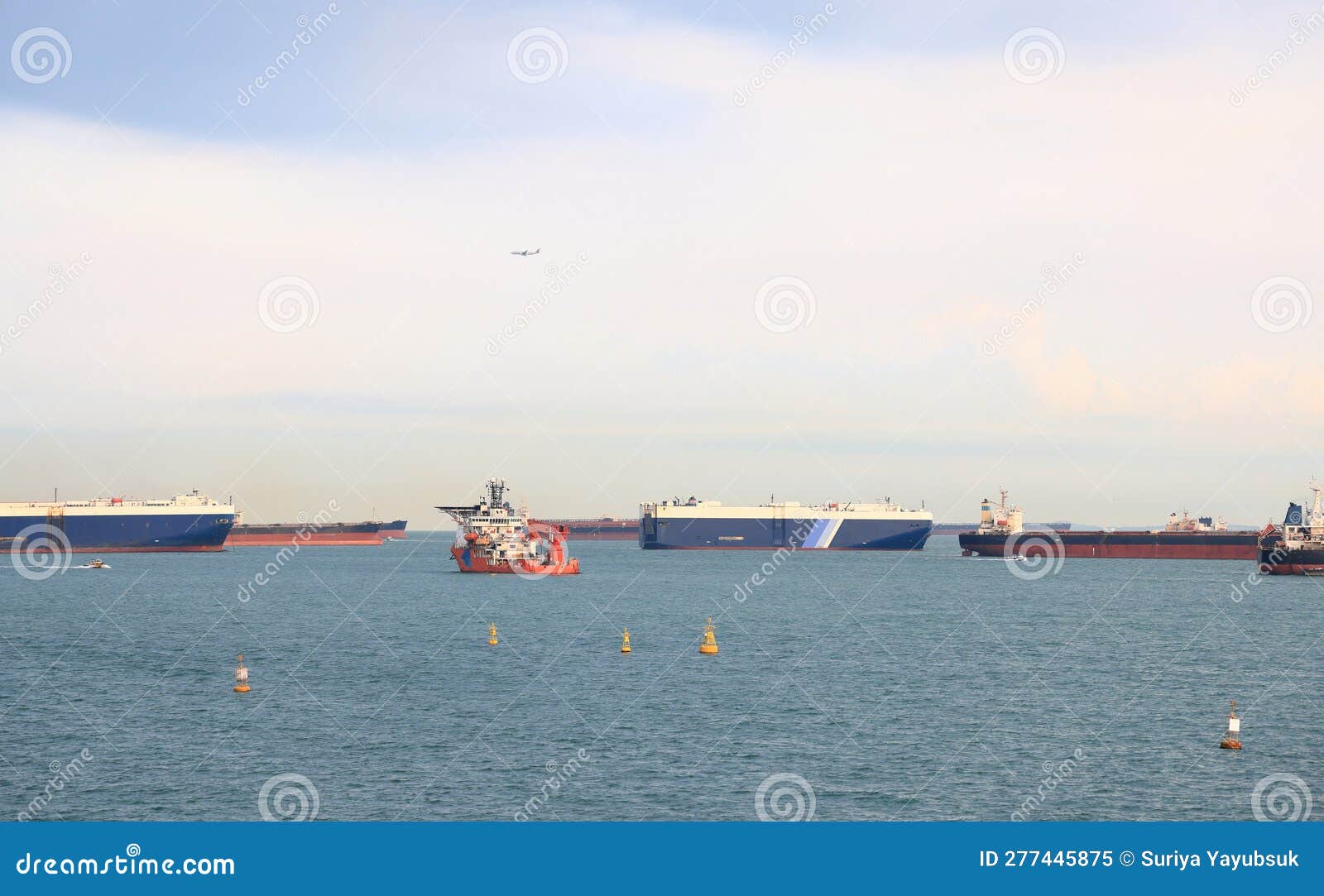 ocean liner, tanker and cargo ship in singapore strait