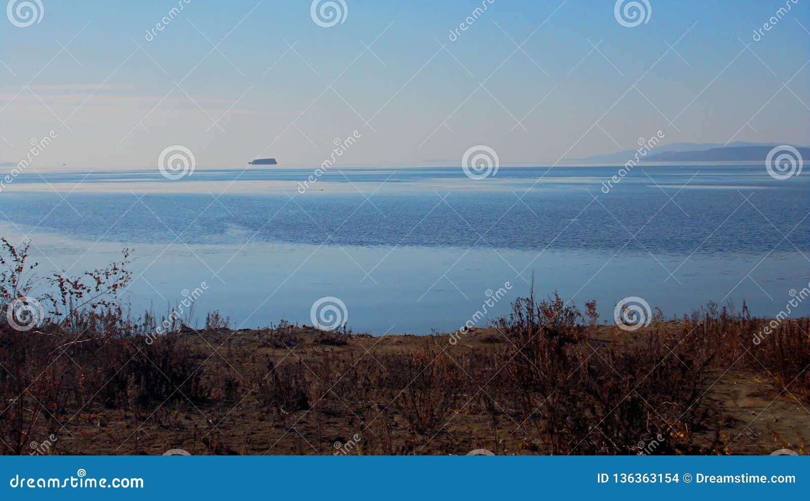 Black Sea Beach Nude - The Ocean Merges With The Sky. Winter. Naked Beach. Blue Ice ...