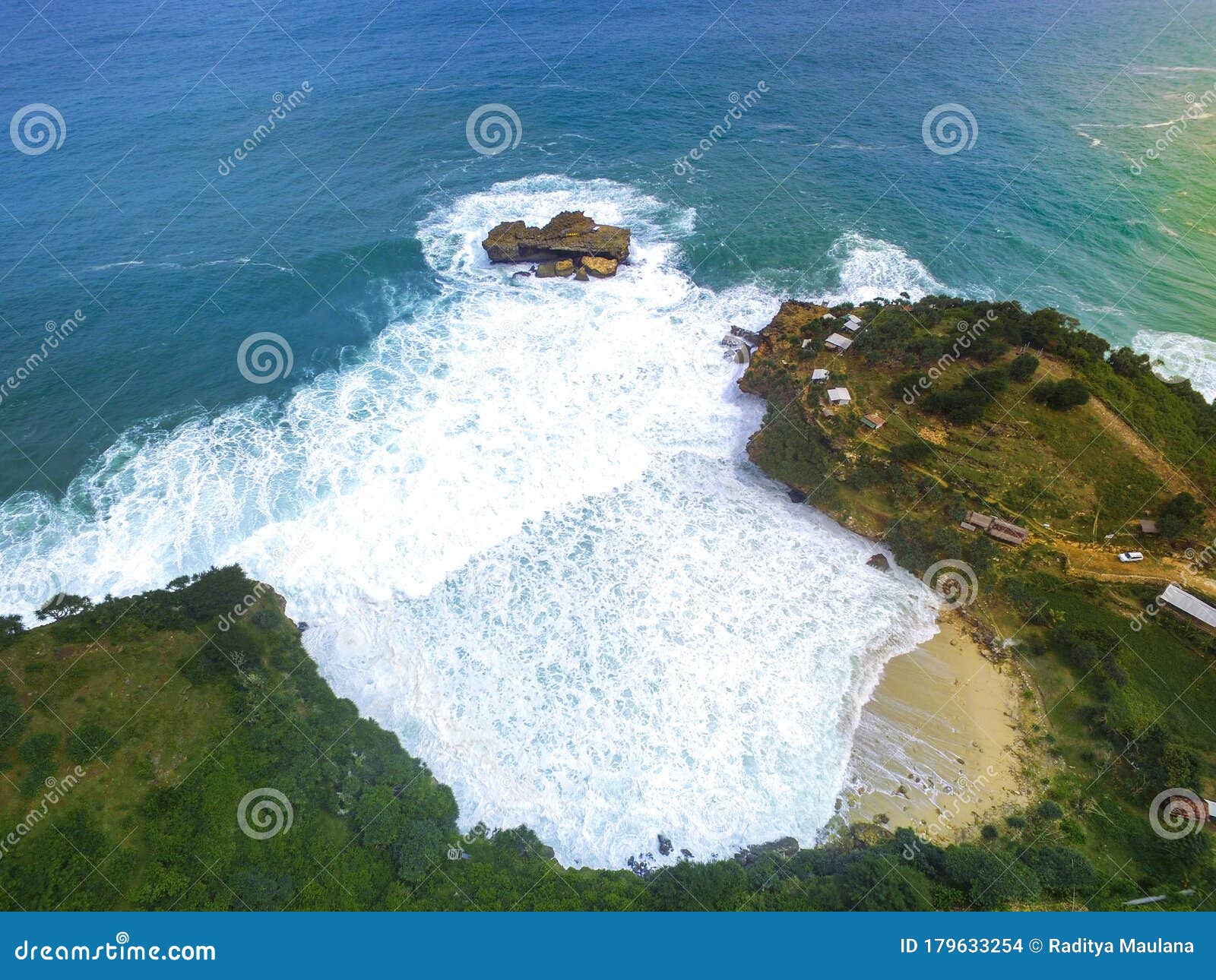 op view of waves break on tropical white sand beach