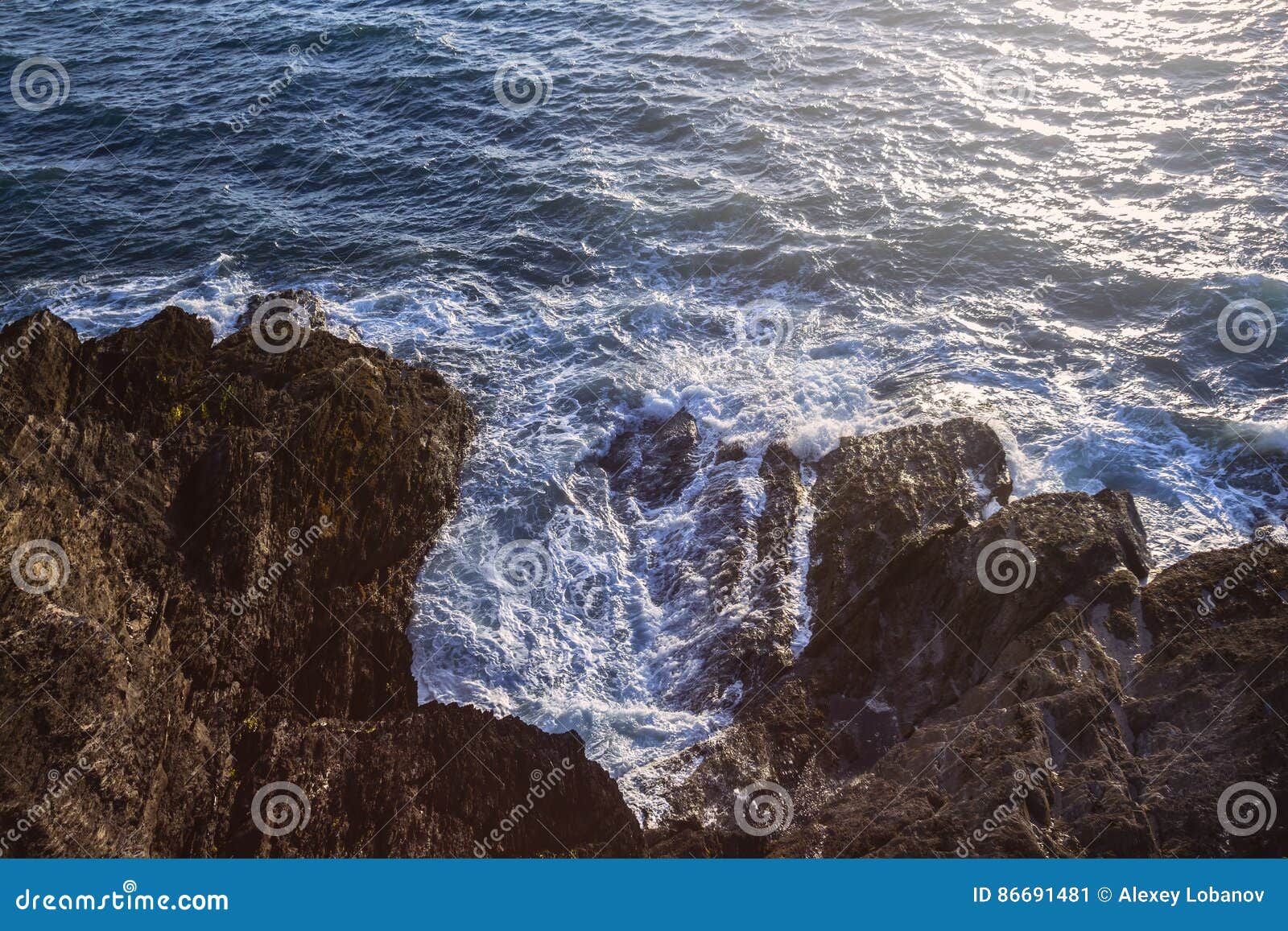 ocean waves lapping on the rocks