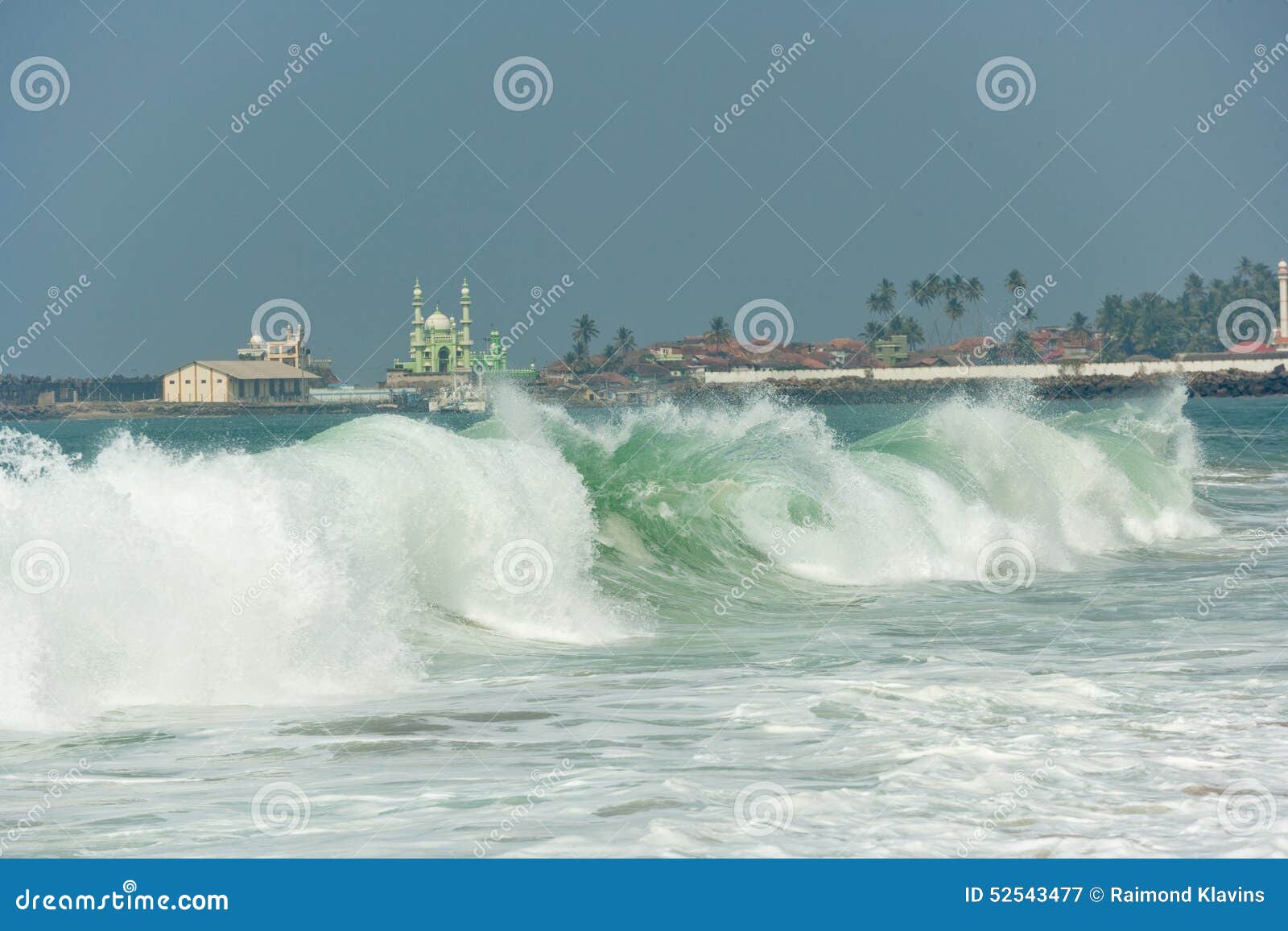 oceanic wave and minaretes at background