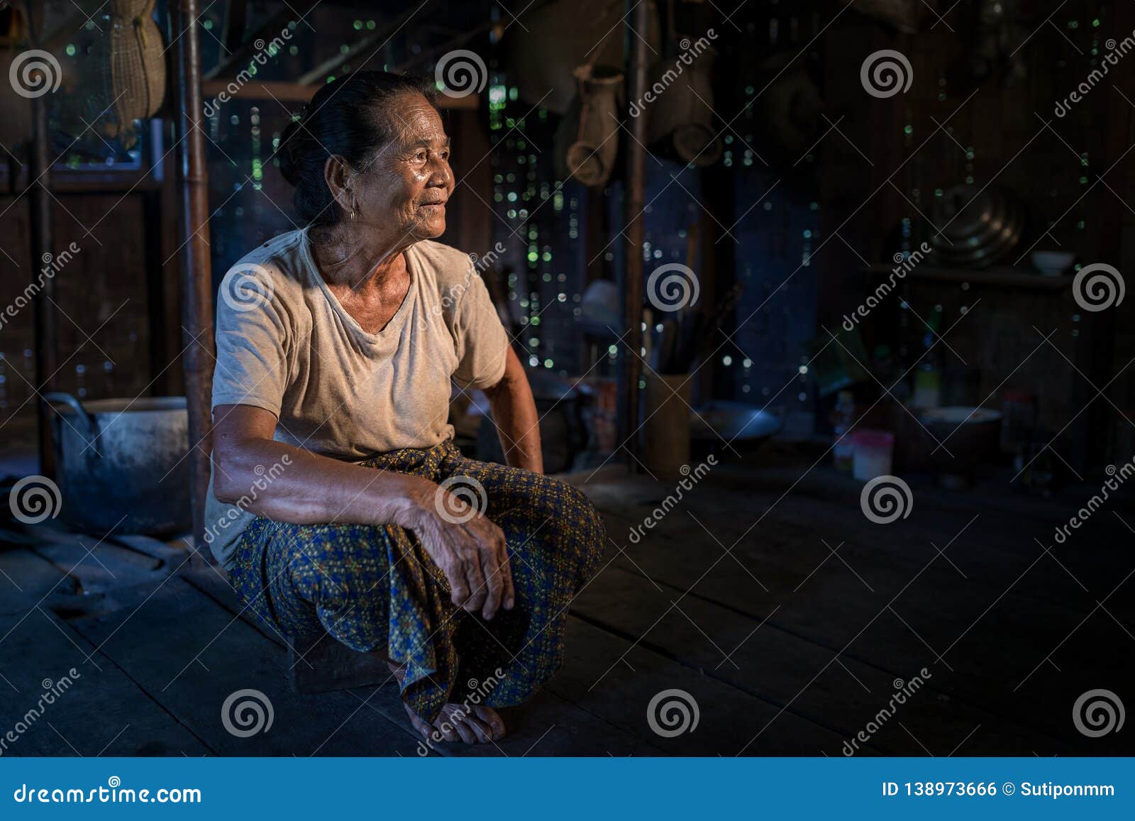 21 October 2019 KhunKham Khammouane Laos. Senior Lao women sitting in the kitchen are cooking for dinner traditional lifestyle people in rural of Laos