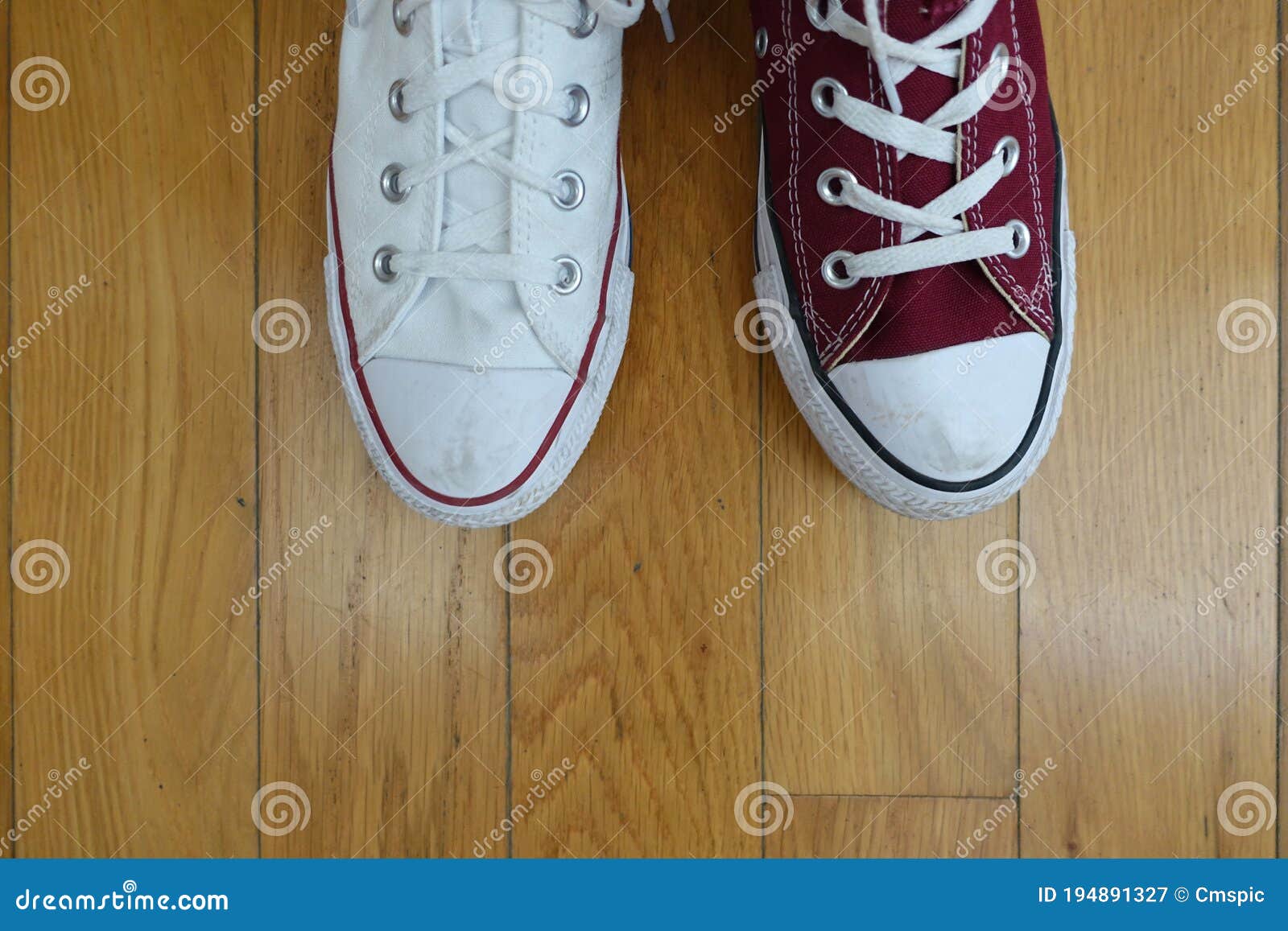 Odd Shoes, One Red and One White Stock Image Image of break, mischief
