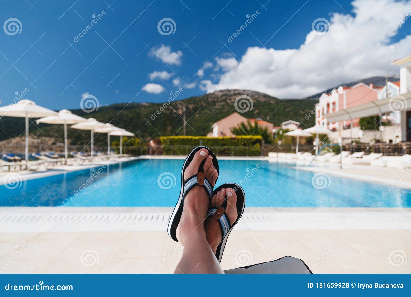 Odyssey Hotel, Agia Efimia, Cephalonia Island, Greece - July, 14 2019: Close Up View of Young Woman in Tommy Hilfiger Blue Fl Stock Photo - Image of footwear, feet: 181659928