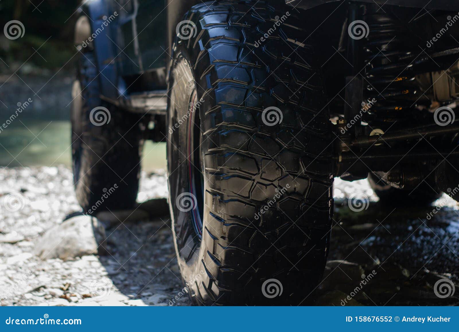 Off Road Car Suspension. Wheel of the Offroad Pickup Stock Photo