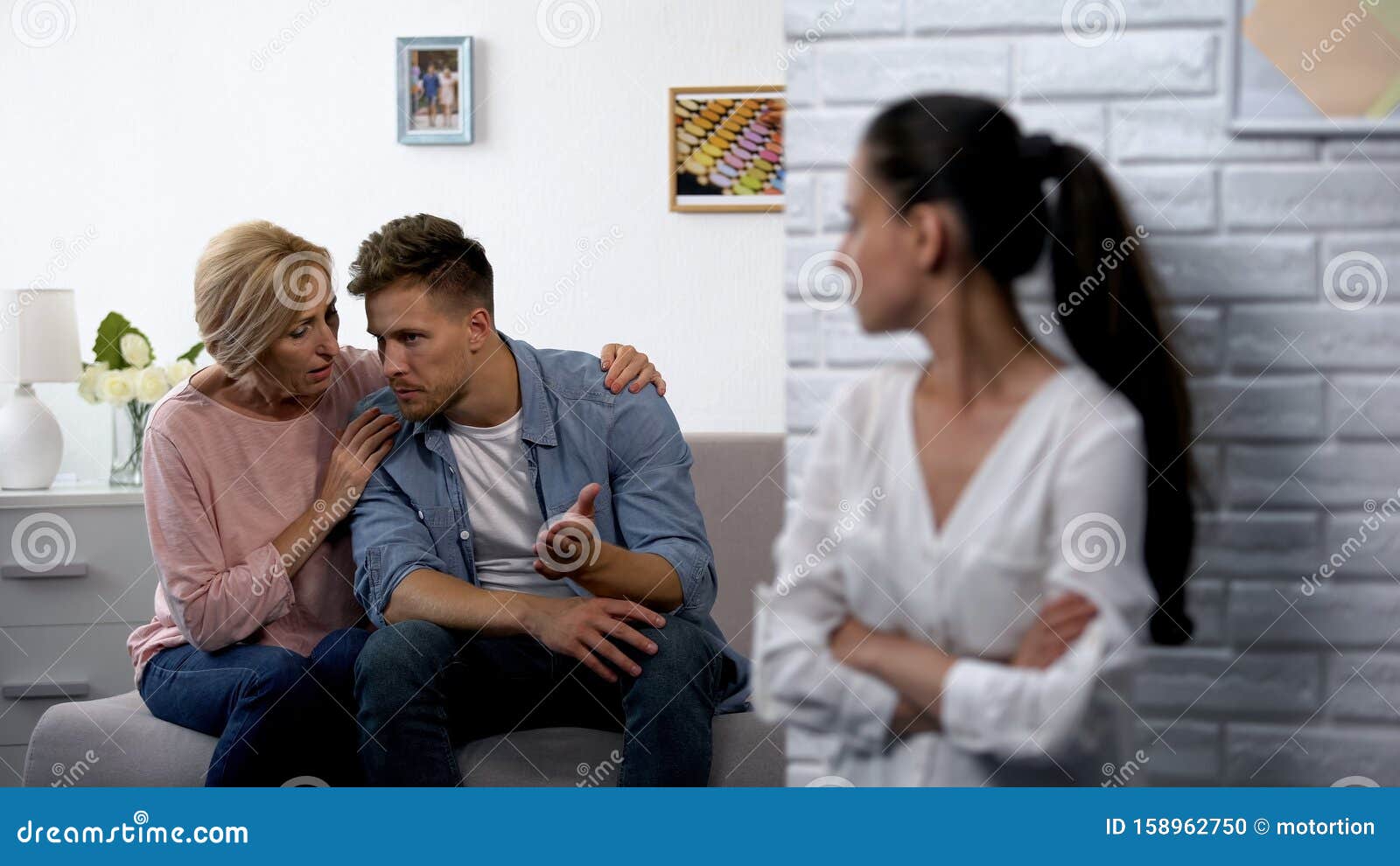 Offended Woman Secretly Watching Mother In Law Consoling Husband After