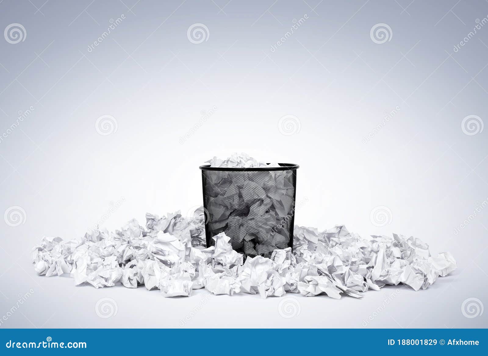 Office basket with crumpled paper isolated on white background