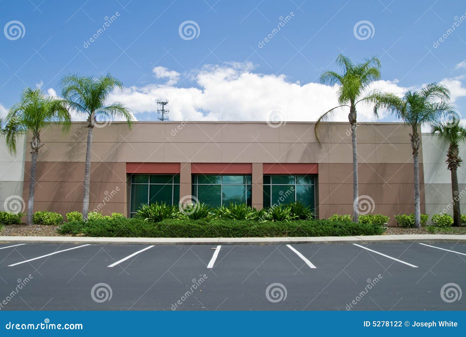 office building with parking spaces