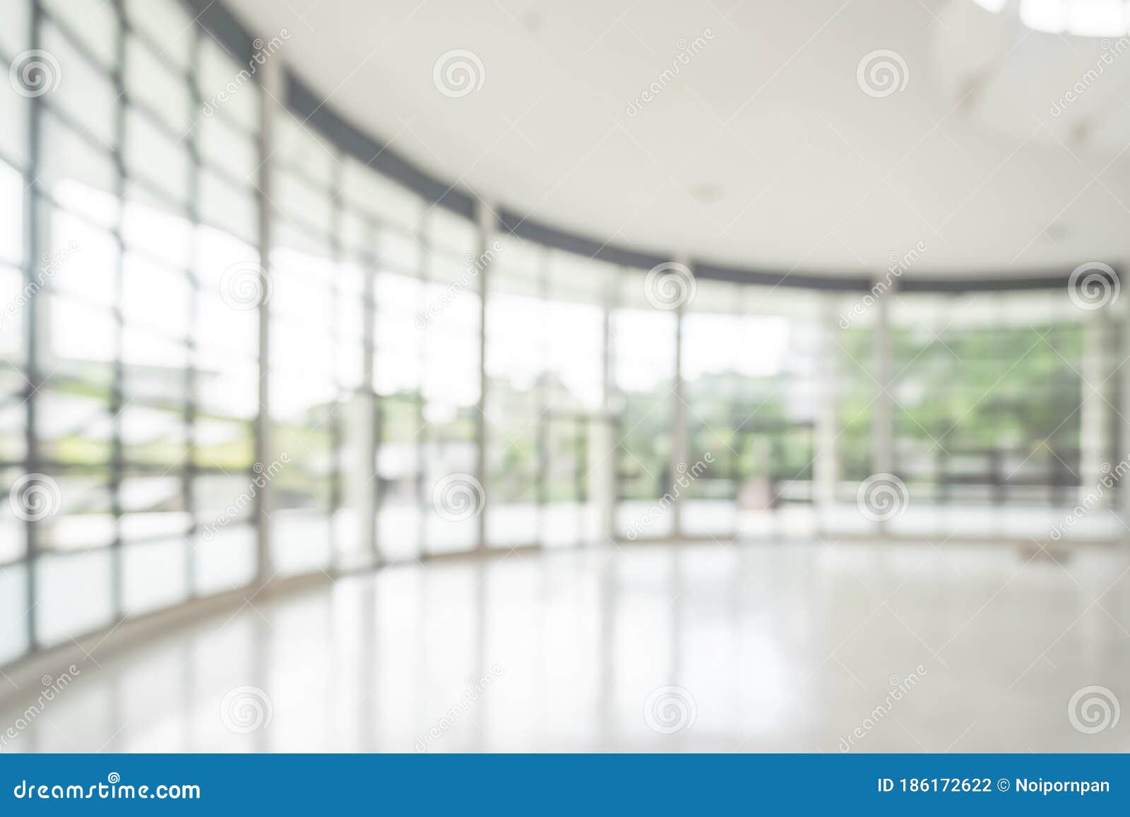 office building or university lobby hall blur background with blurry school hallway corridor interior view toward empty corridor