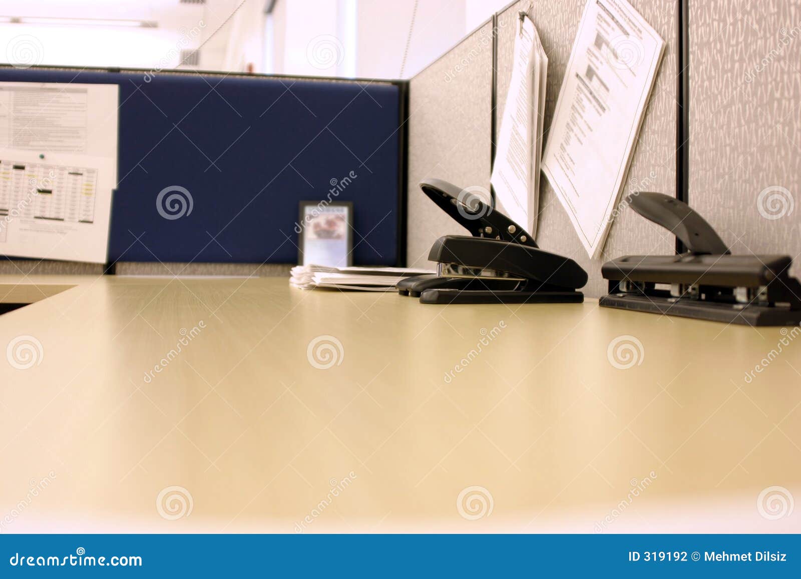 office desk with hole puncher and stapler