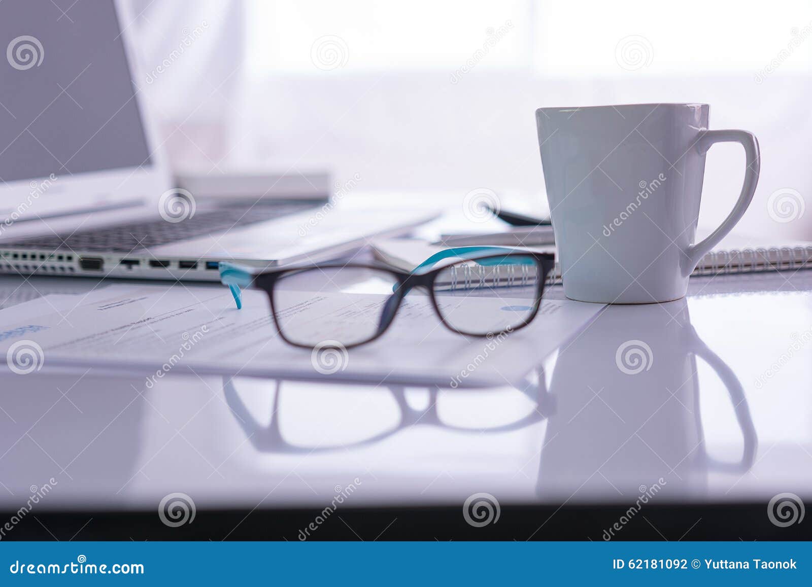 Office Desk with Laptop, Pens, Glasses Stock Photo Image of table