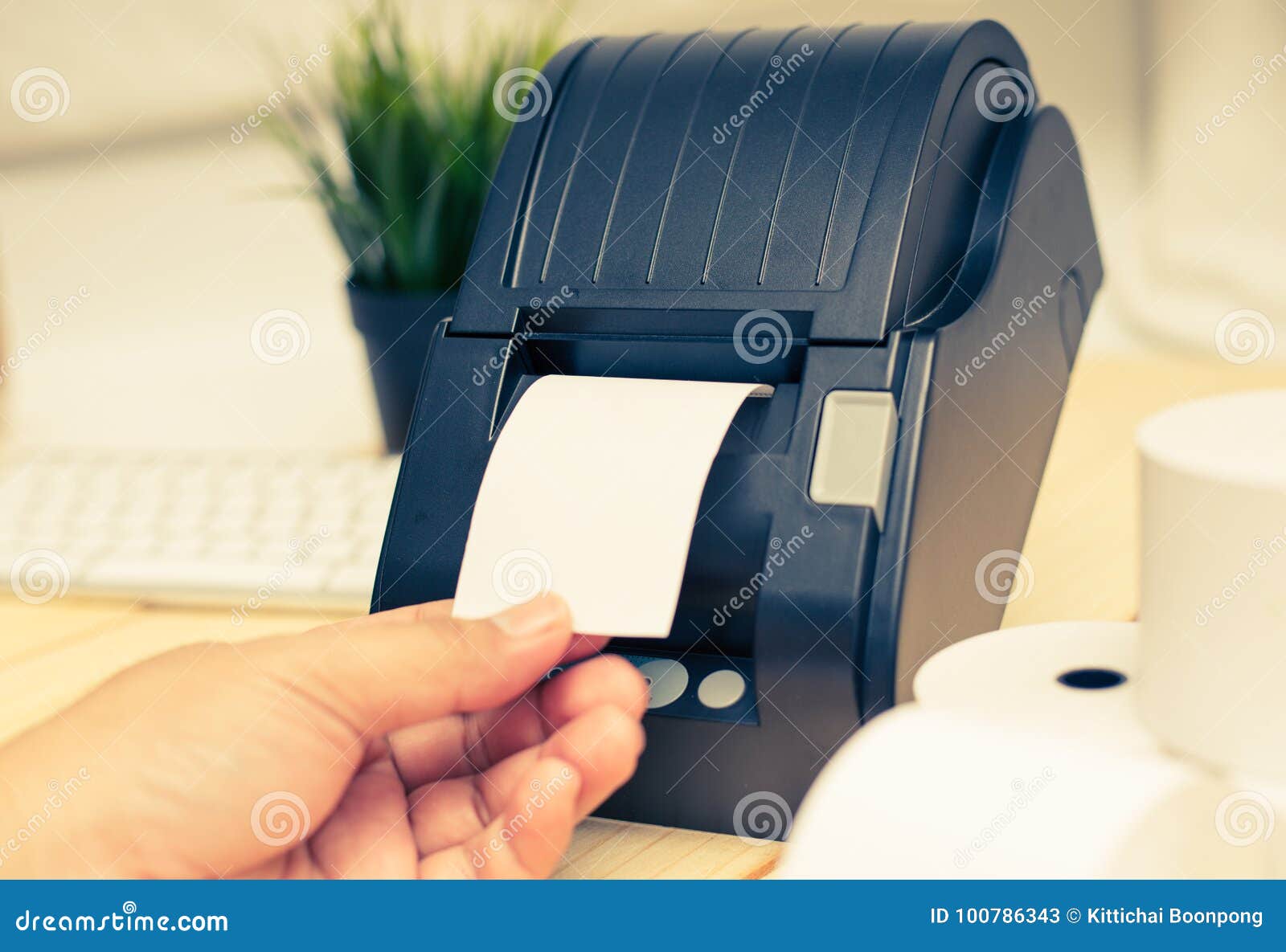 Office Equipment, a Point of Sale Receipt Printer Printing a Receipt