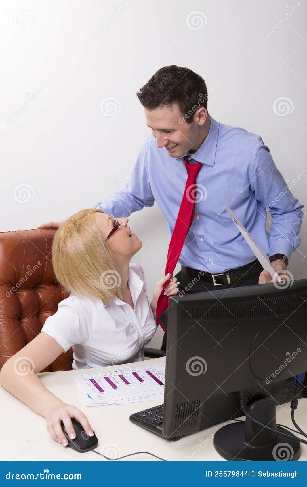 seducing her manager at office pulling on his red necktie seducing her manager at office pulling on his red necktie
