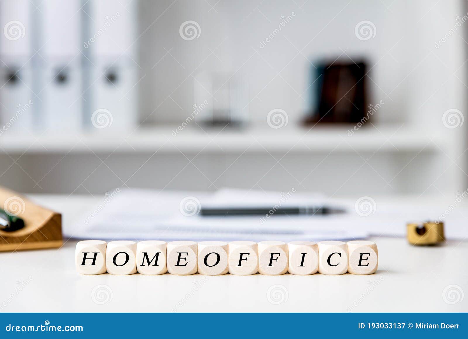 office at home workplace with dices, english word homeoffice