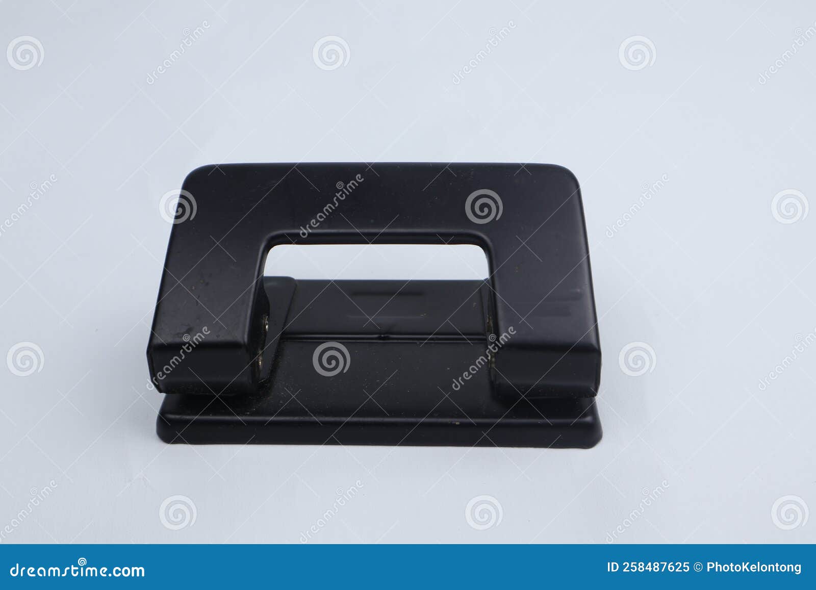 Office Paper Perforator Isolated on White Background. Office Tool