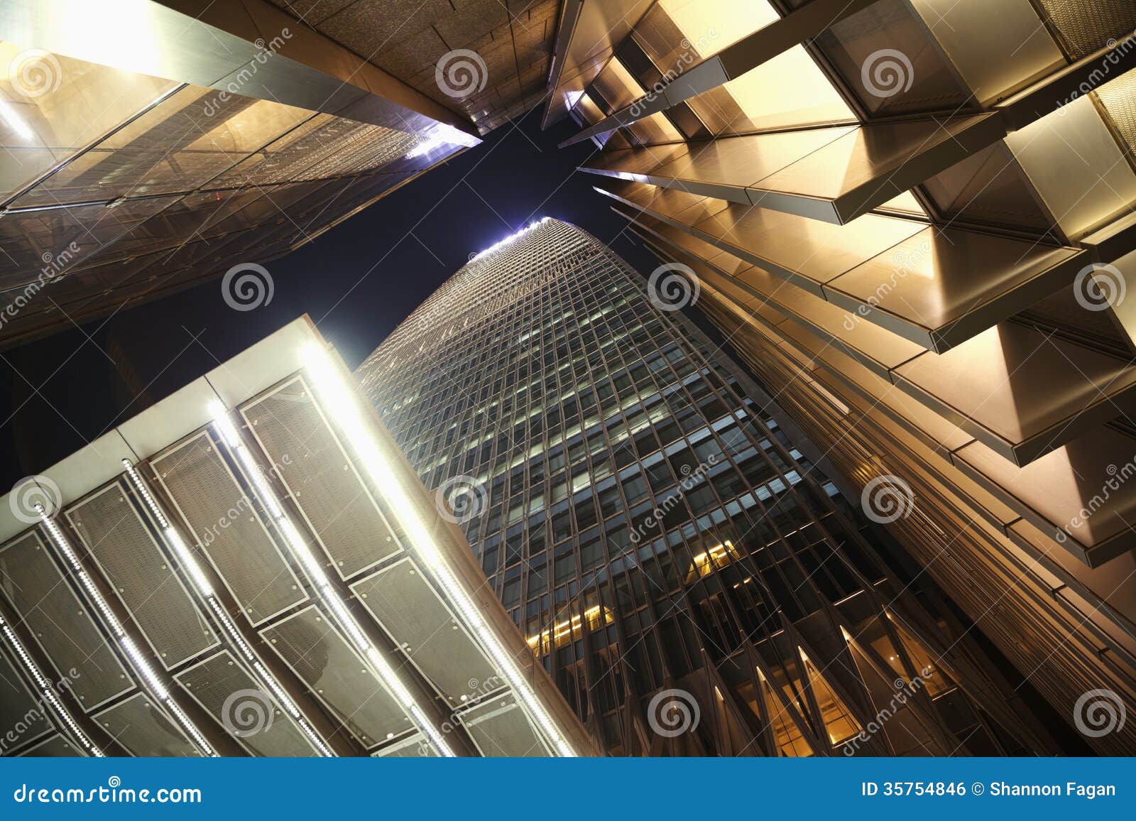 office skyscraper, directly below, night time