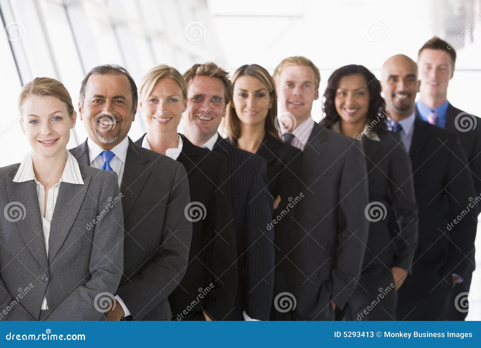 Office staff lined up stock image. Image of associates 5293413
