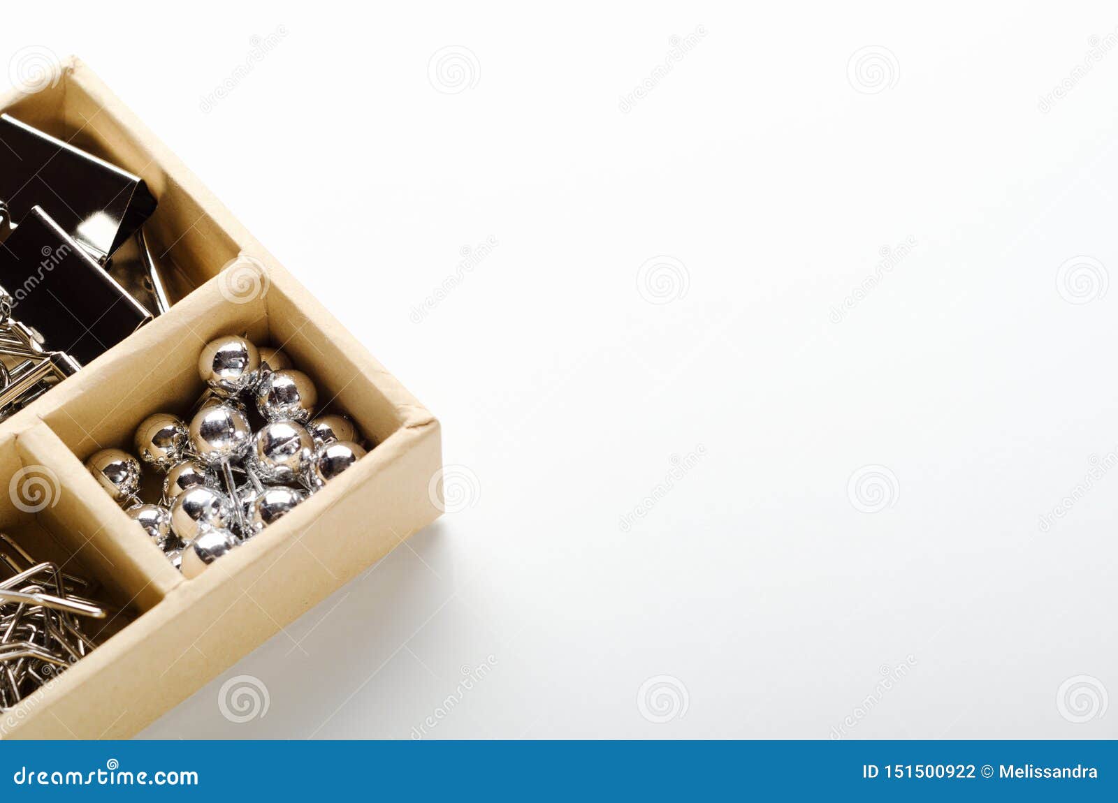 Office Supplies in a Box on a White Background, Table Organization