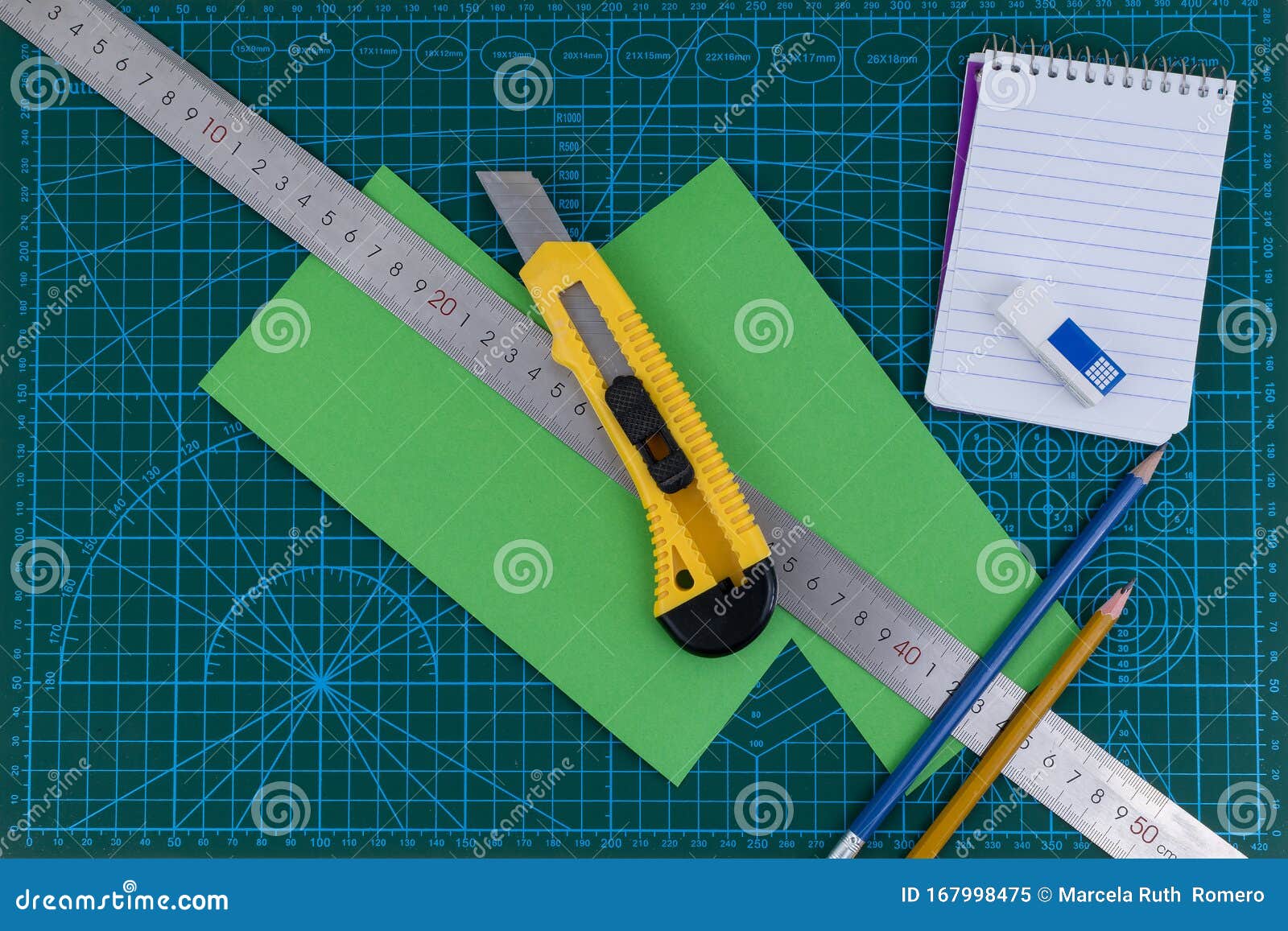 Office Supplies on Green Cutting Mat Board Stock Image - Image of