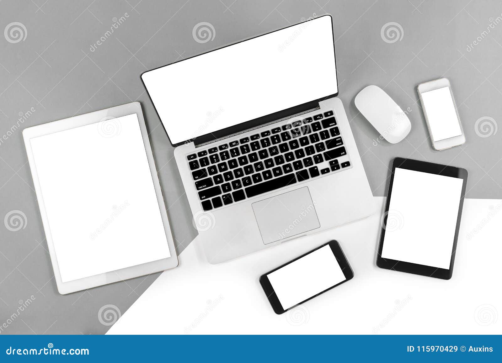 office table with laptop computer, digital tablet, smartphone an