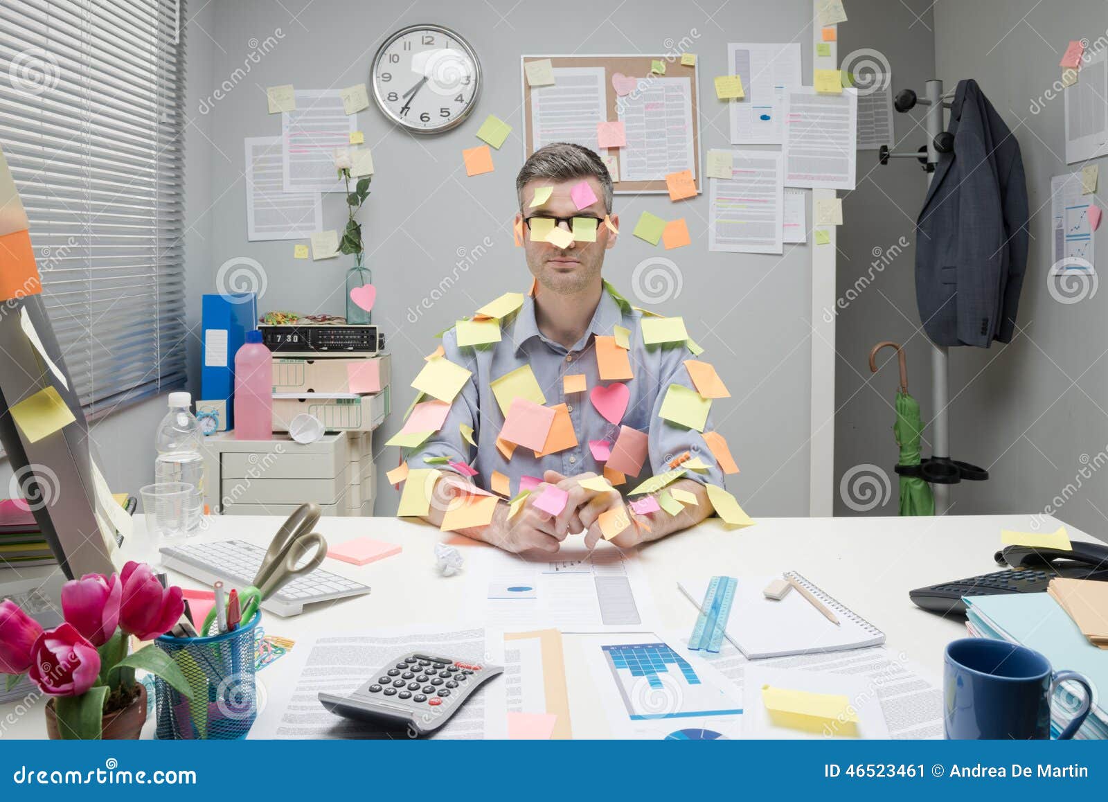 office worker covered with stick notes