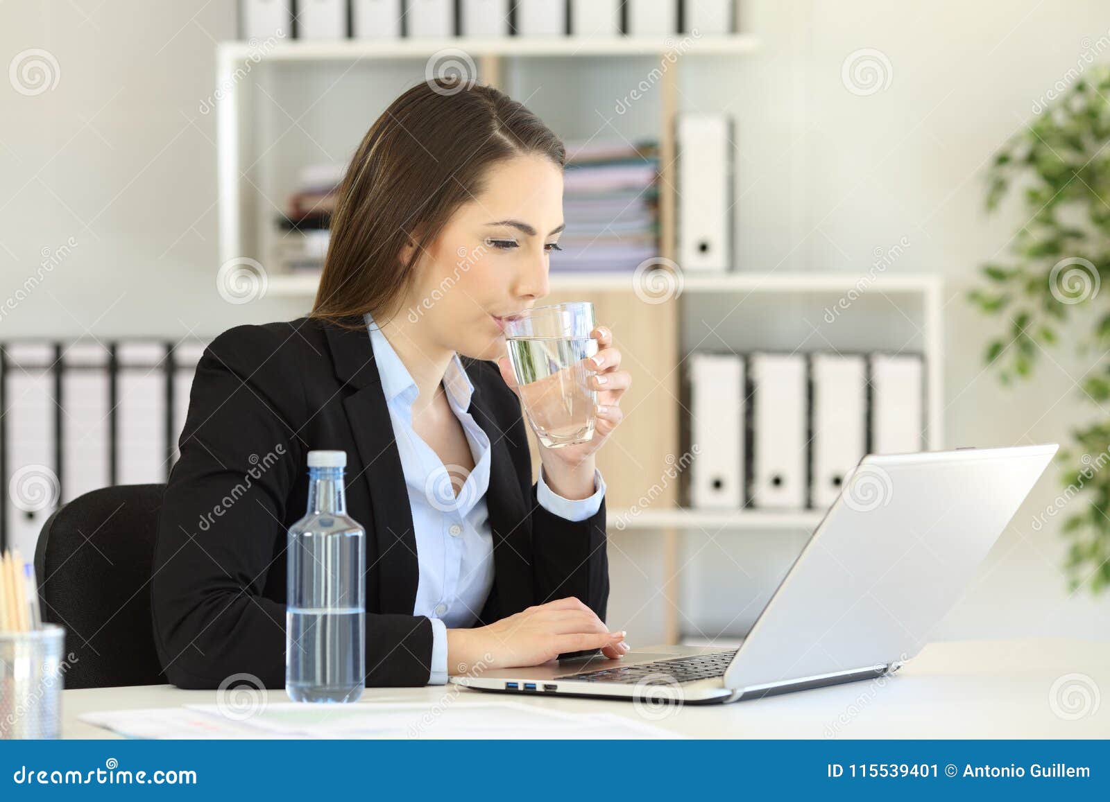 Office Worker Drinking Water Working on Line Stock Image Image of