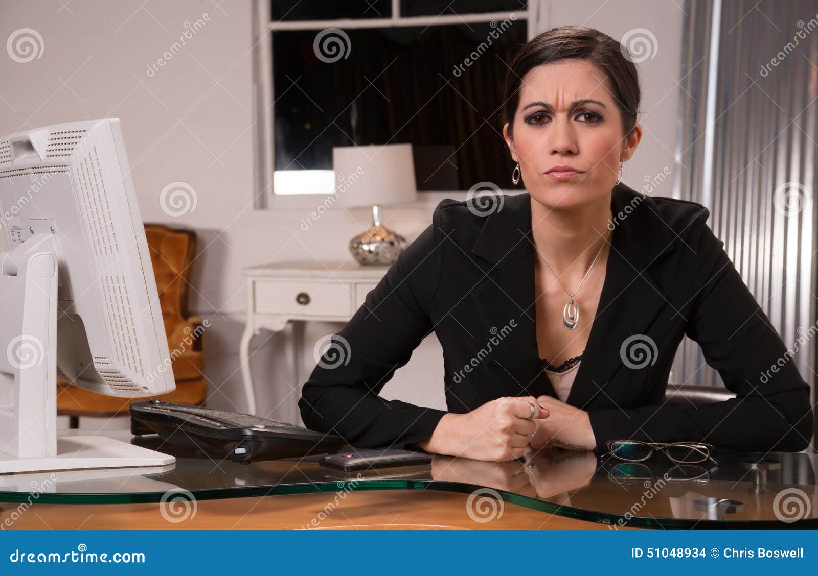 Office Worker Female Business Woman Slams Fist On Desk Stock Photo