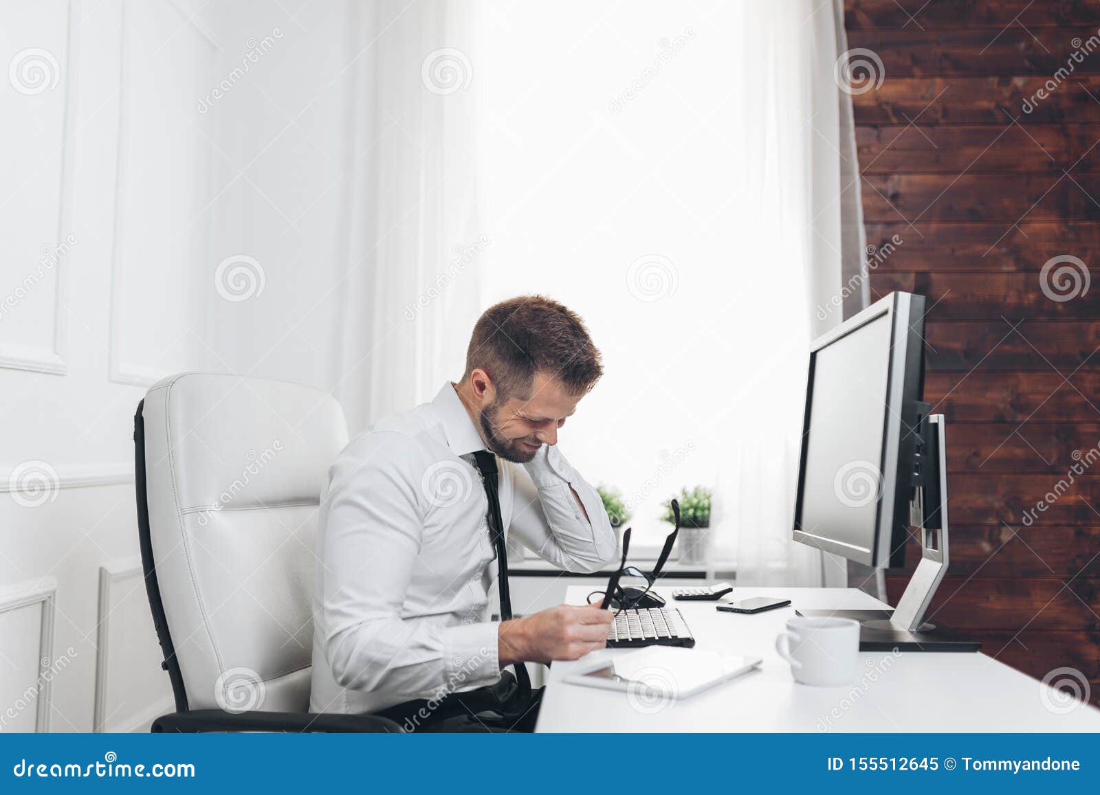 Office Worker With Pain From Sitting At Desk All Day Stock Image
