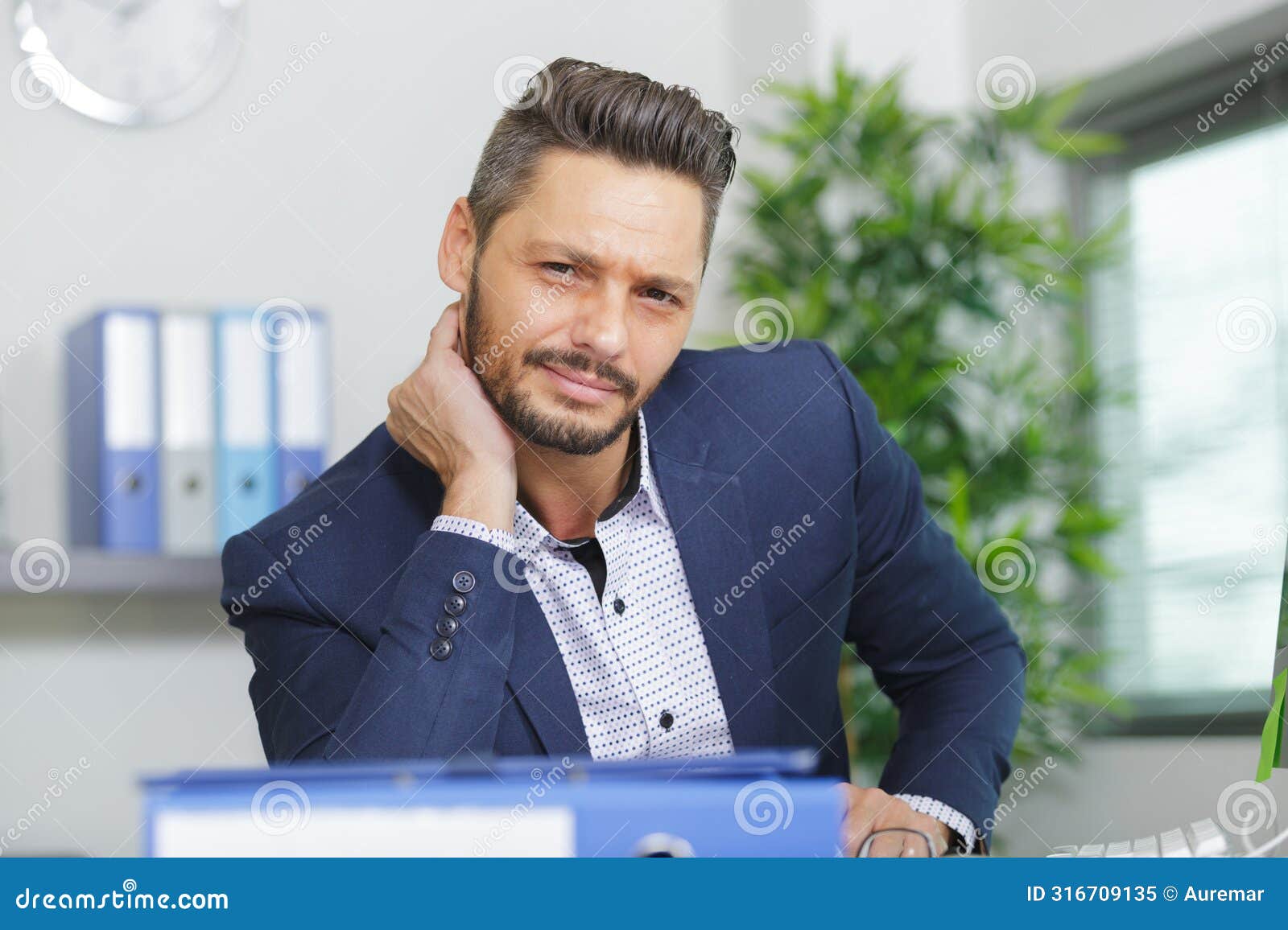 office worker with stiff neck